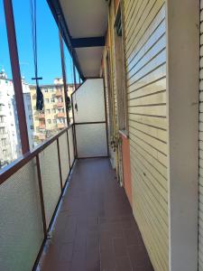 a balcony with a view of a building at CASA DI LORY in Milan