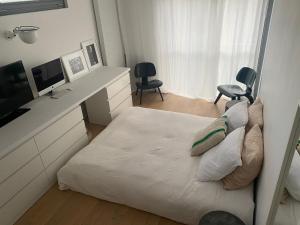 Postel nebo postele na pokoji v ubytování Maison d'architecte - Piscine