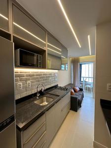 Dapur atau dapur kecil di Apartamento lindo e completo em Salvador