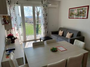 Posedenie v ubytovaní Ennodio Apartment