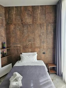 Postel nebo postele na pokoji v ubytování Binario1 Rooms
