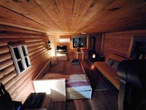an overhead view of a living room with a couch at Pipi Vityilló in Füzérradvány