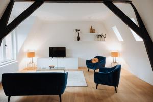 TV a/nebo společenská místnost v ubytování Castellum Residence Brugge