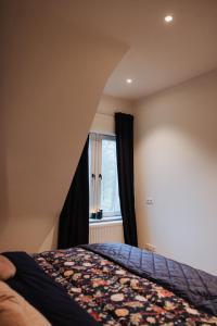 Postel nebo postele na pokoji v ubytování Castellum Residence Brugge