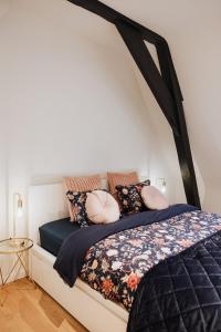 Postel nebo postele na pokoji v ubytování Castellum Residence Brugge