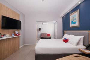 TV a/nebo společenská místnost v ubytování Holiday Inn Express - Malta by IHG