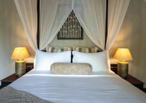 Katil atau katil-katil dalam bilik di Red Thread Morjim