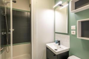 a bathroom with a sink and a shower at Belle Dune in Fort-Mahon-Plage +20 photos