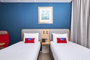 Postel nebo postele na pokoji v ubytování Holiday Inn Express - Malta by IHG