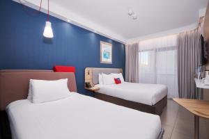 Postel nebo postele na pokoji v ubytování Holiday Inn Express - Malta by IHG