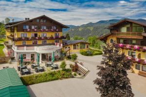 an aerial view of a hotel with a courtyard and a building at Burgfellnerhof - Adults Only in Schladming