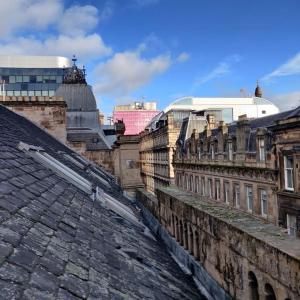 a view from the roof of an old building at Casa de Canada Court in Glasgow