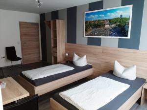 Postel nebo postele na pokoji v ubytování Haus Roseneck-Pension Am Stadtrand