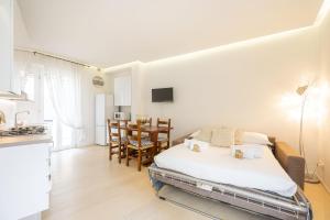 Ένα ή περισσότερα κρεβάτια σε δωμάτιο στο Casa Maria - tra Verona Centro e Stazione Treni