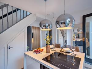 a kitchen and dining room with a table and chairs at 2 Bed in Chester 94153 in Chester