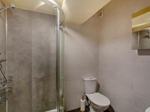 a bathroom with a shower and a toilet at 2 Bed in Malham 94261 in Airton