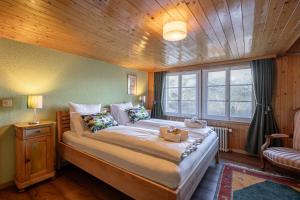 Postel nebo postele na pokoji v ubytování Chalet Schweizerhof Attic