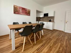 Kuchyň nebo kuchyňský kout v ubytování Hotel Klimt