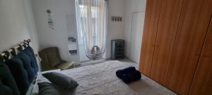 Postel nebo postele na pokoji v ubytování Casa Noemi