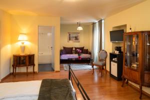 Postel nebo postele na pokoji v ubytování Locanda Villa d' Epoca