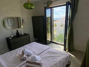 Postel nebo postele na pokoji v ubytování Luxury Villa "SREĆA" + 30 fotografií