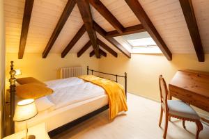 Postel nebo postele na pokoji v ubytování Locanda Villa d' Epoca