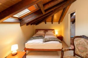 Postel nebo postele na pokoji v ubytování Locanda Villa d' Epoca