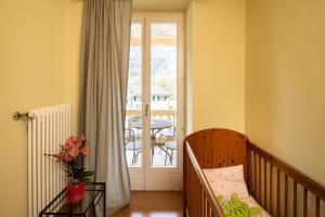 Postel nebo postele na pokoji v ubytování Locanda Villa d' Epoca