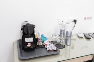 Coffee and tea making facilities at 247 Luxury Rooms Trastevere