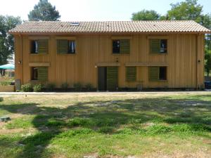 a large house with green shutters on it at HERMITAGE DURAS in Anzex