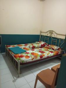 Cama ou camas em um quarto em Hotel Kalingga 2