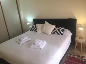 A bed or beds in a room at Dream Apartment in Estepona, Andalusia
