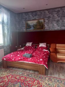 מיטה או מיטות בחדר ב-Kiskassa Vendégház 2
