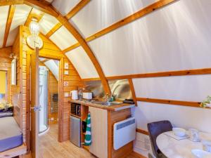 a kitchen and living room in a tiny house at 1 Bed in Bristol 94007 in Chew Magna