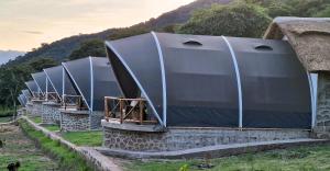 a row of domed buildings on a hill at Africa Safari Rift Valley 