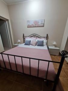 Postel nebo postele na pokoji v ubytování Villa Leale