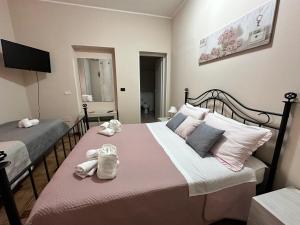 Postel nebo postele na pokoji v ubytování Villa Leale