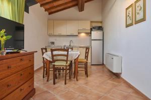 A kitchen or kitchenette at Poggio all'Agnello Sport & Family Holidays