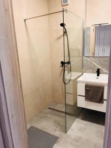 Kúpeľňa v ubytovaní Gréta Lux Apartman