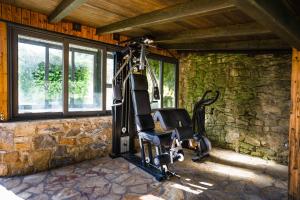 Posilňovňa alebo fitness centrum v ubytovaní Rifugium