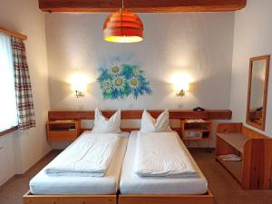 Voodi või voodid majutusasutuse Hotel Acla Filli toas