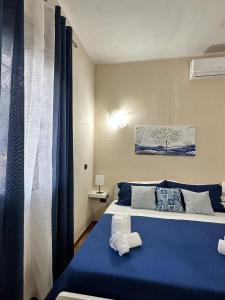 Postel nebo postele na pokoji v ubytování Villa Leale