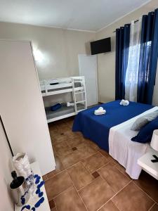 Postel nebo postele na pokoji v ubytování Villa Leale