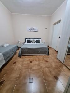 Postel nebo postele na pokoji v ubytování Villa Leale
