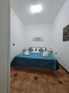 Postel nebo postele na pokoji v ubytování Villa Leale