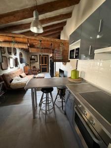Η κουζίνα ή μικρή κουζίνα στο Apartamentos Basilicus