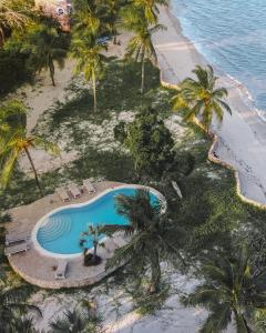 an overhead view of a swimming pool on a beach at Mwazaro Beach Lodge in Shimoni