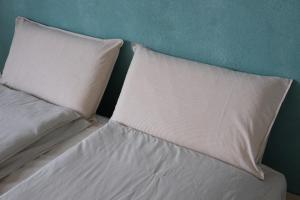 Postel nebo postele na pokoji v ubytování B&B Colori Del Lago