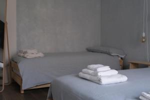 Postel nebo postele na pokoji v ubytování B&B Colori Del Lago