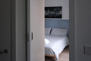 Postel nebo postele na pokoji v ubytování B&B Colori Del Lago